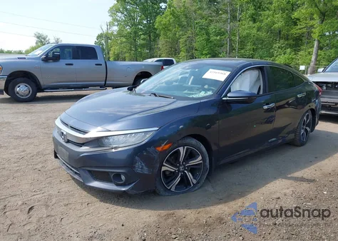 2016 Honda Civic Touring z USA, uszkodzony, nr VIN 19XFC1F97GE010605